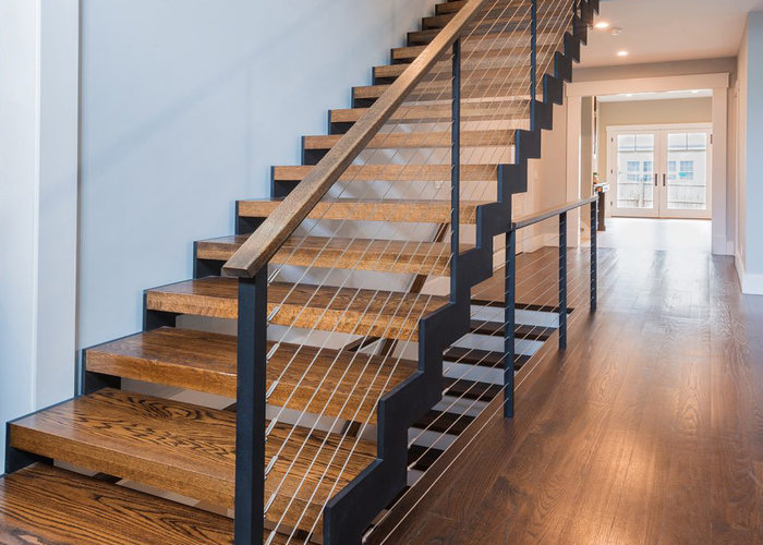 Zigzag stairs with American red oak treads and top rail.