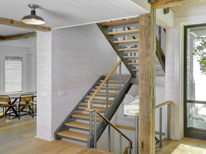 U shaped enclosed double stringer staircase by Keuka Studios