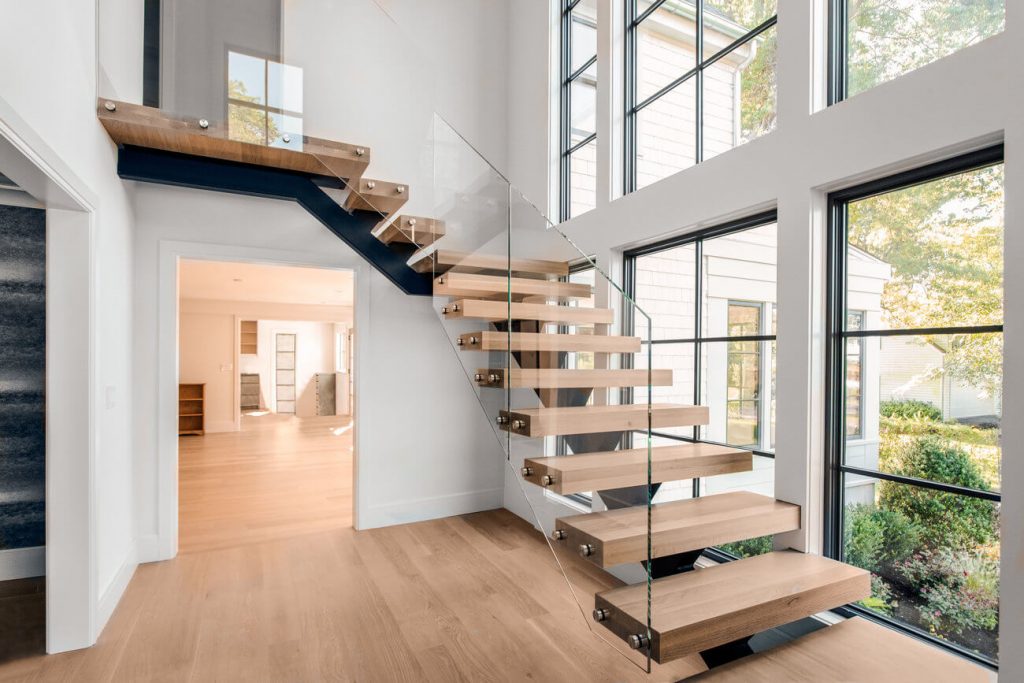 Glass railing floating staircase for home entryway