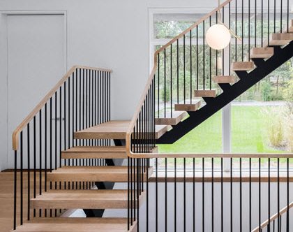 modern floating staircase with spindles