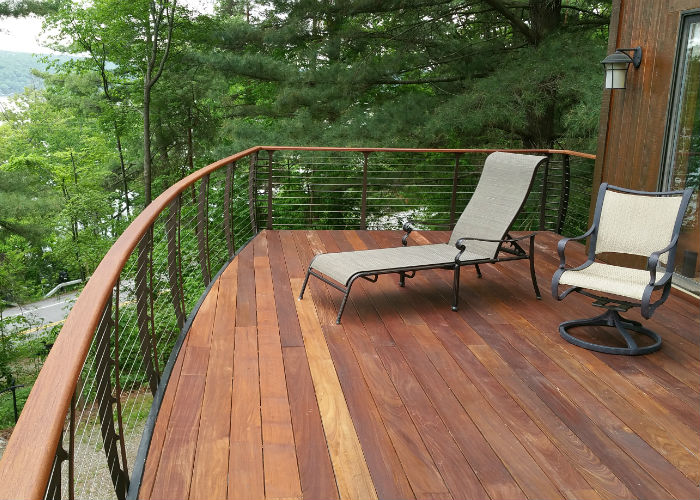 curved raised deck in the forest with IPE decking.