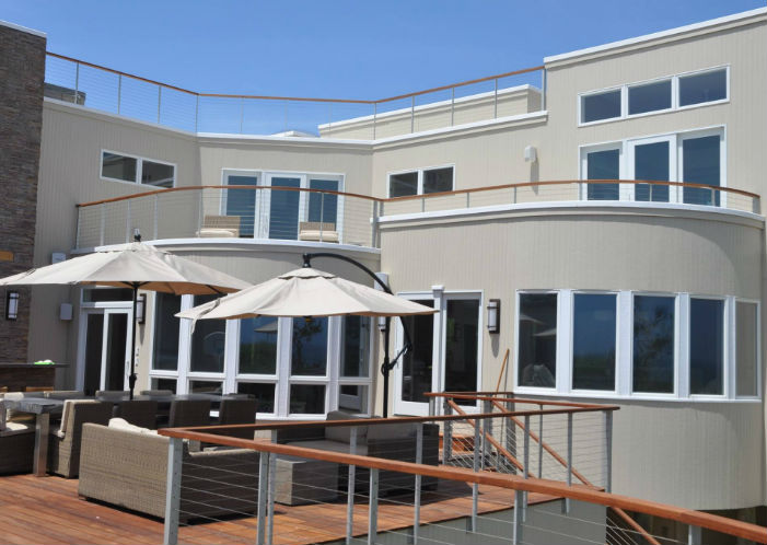 contemporary deck railing on multi-level home 