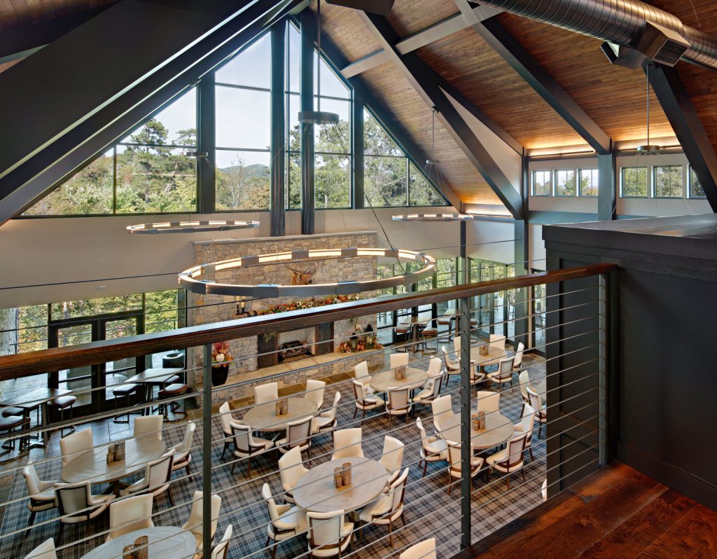 Overlooking corporate retreat dining atrium through cable railings