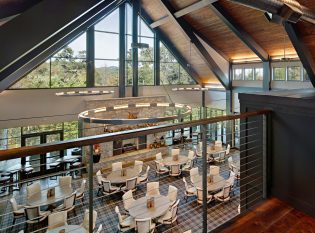 Cable railings on loft overlooking corporate dining area