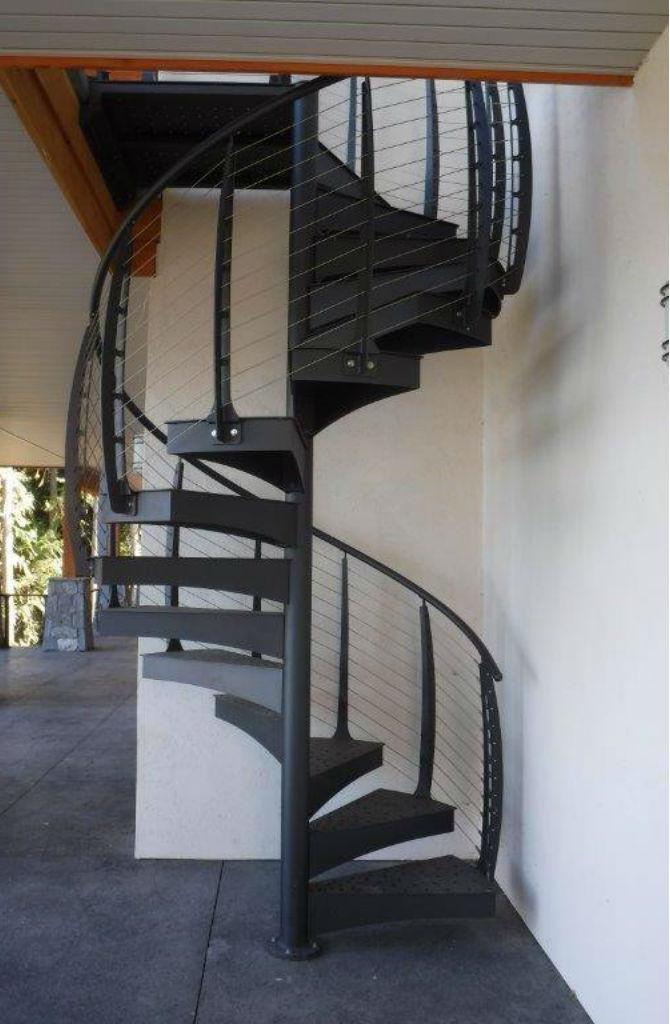 Spiral staircase with steel treads.