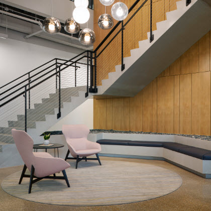 Interior Office Grand Staircase with Sitting Area and Cable Railing System by Keuka Studios