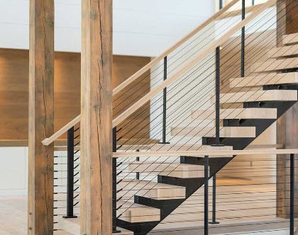 Black Cable Railing system on modern rustic stairs
