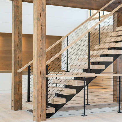 Black Cable Railing system on modern rustic stairs