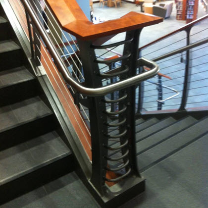 Round handrail seamlessly transitions between levels to meet ADA requirements