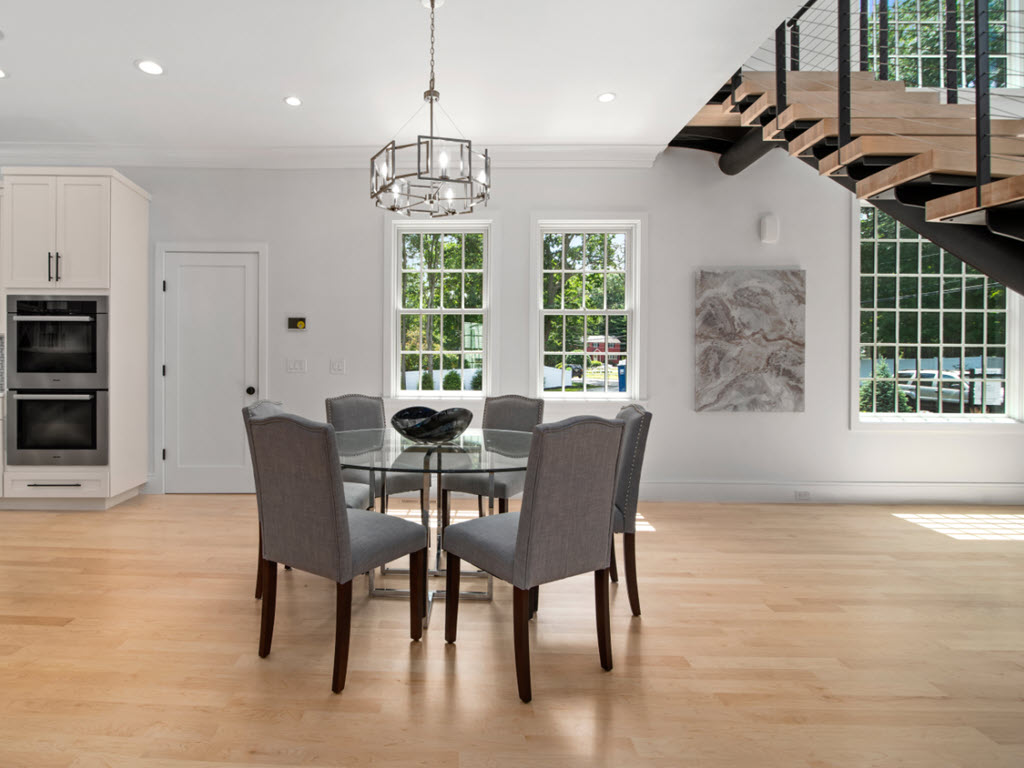 curved stairs in dining room