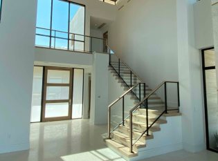 Modern glass stair railing 