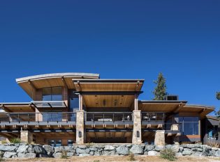 Stone Pillars Steel and Wood Decks with Curved Cable Railing