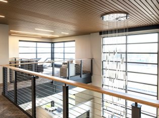 Office Atrium with industrial style cable railing system.