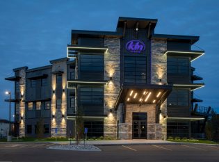 Evening view of KLN office building with exterior railing system