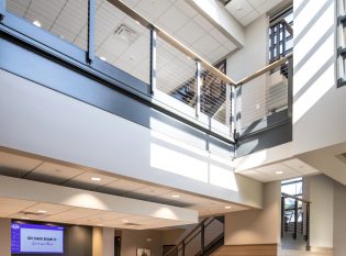 Modern Industrial style cable railing system on office balcony