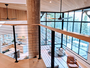 Great Room with upper level balcony and black cable railing system