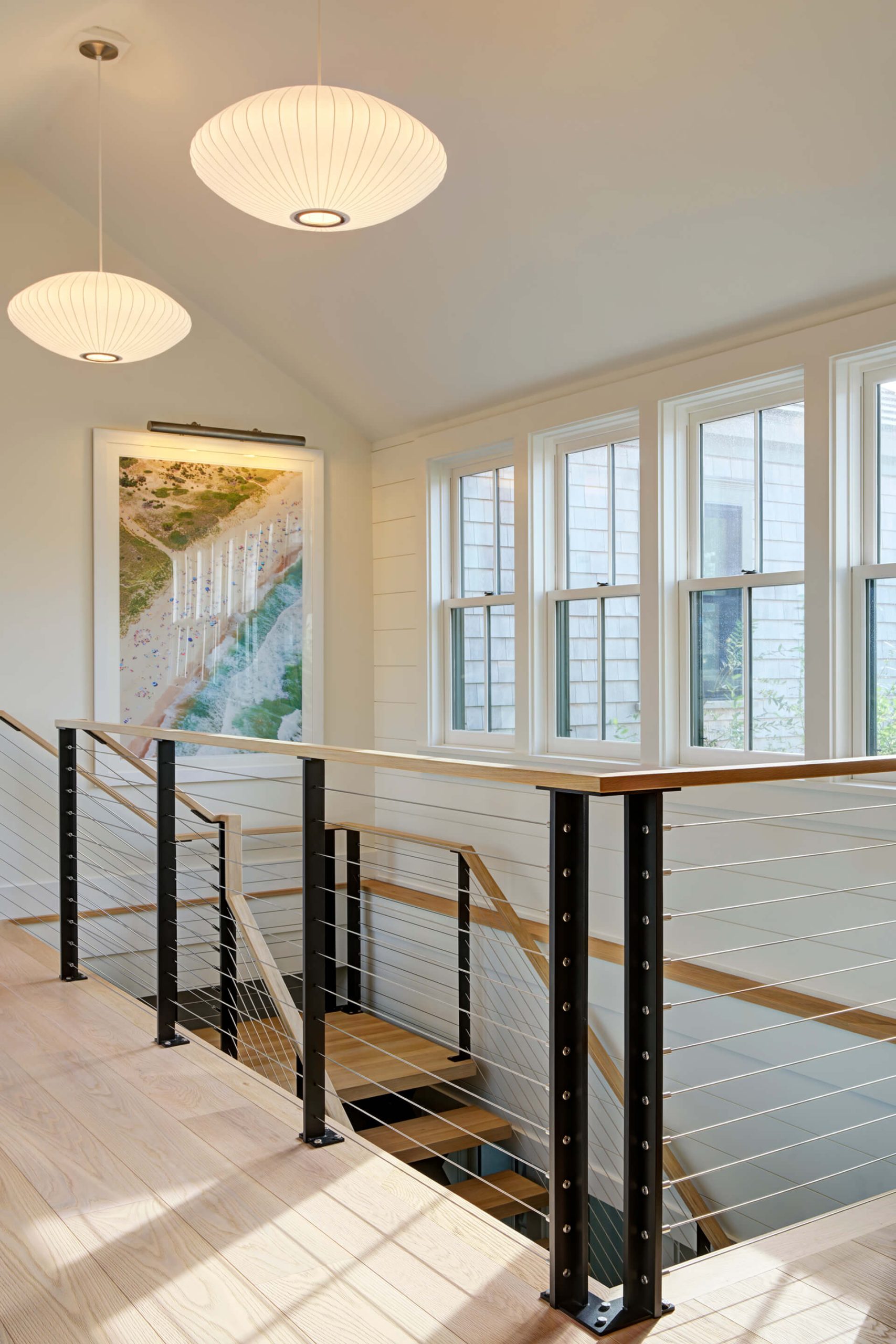 Open stairwell with custom cable railing system