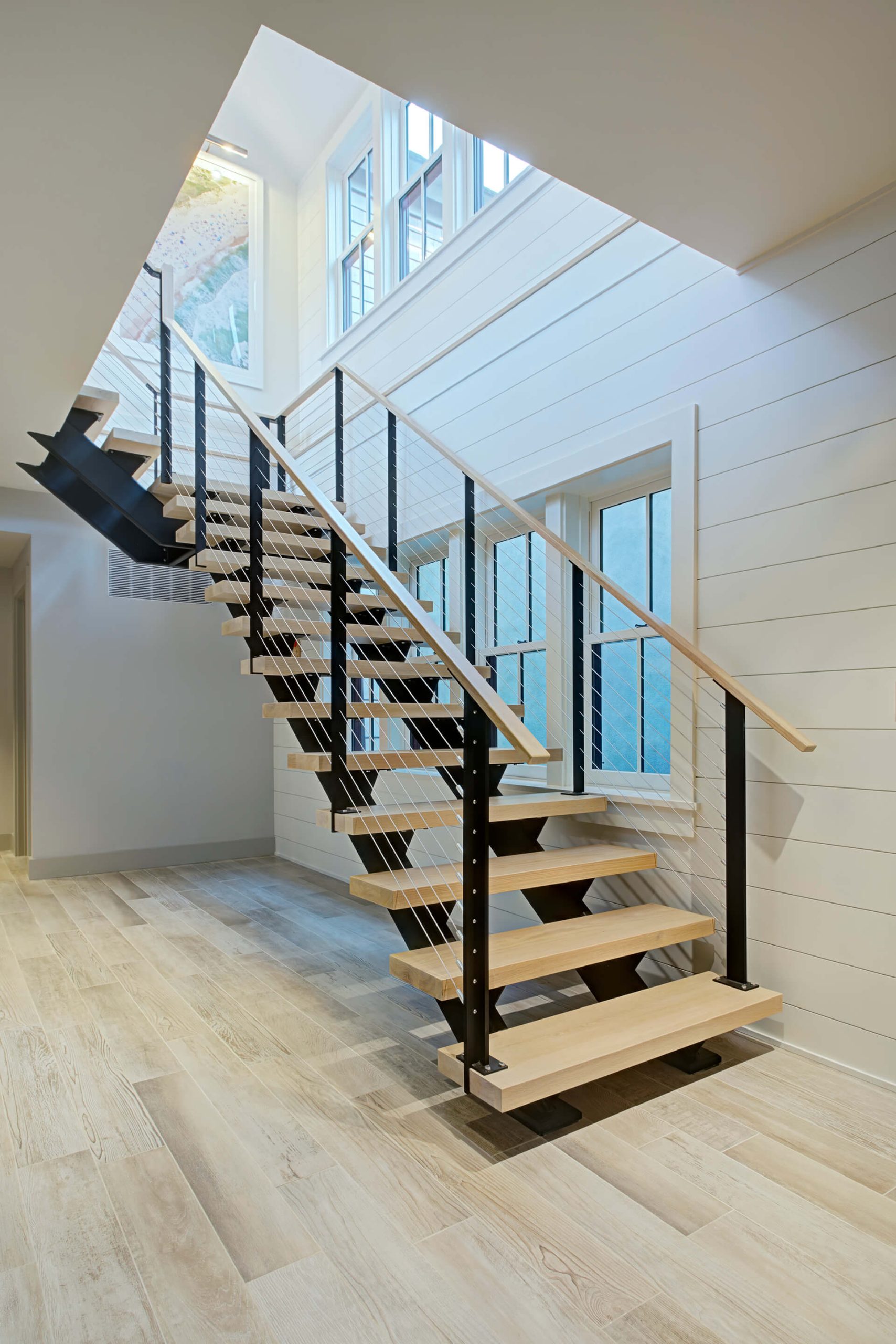Floating Double Stringer Stairs with Custom cable railing system