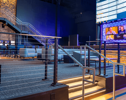 Casino with commercial cable railings on stairs and balconies