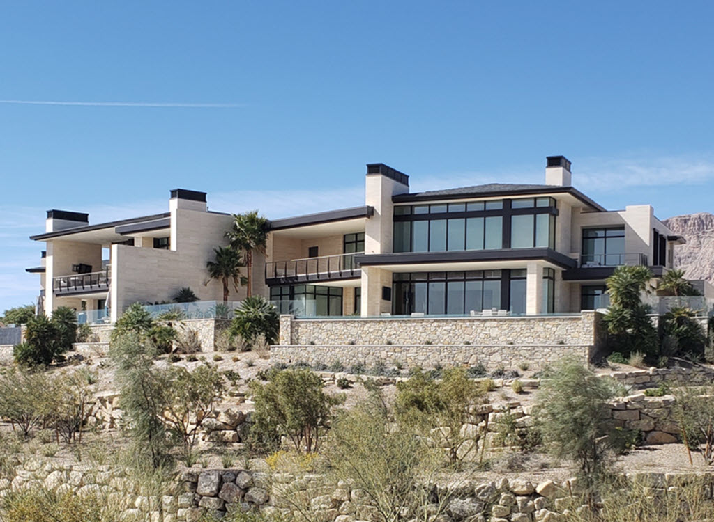 Desert villas with exterior cable railings on the decks.