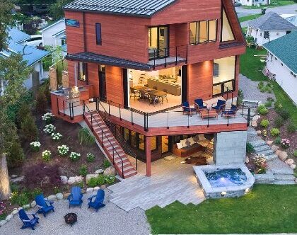 Modern Exterior Cable Railings on deck and stairs of zig zag home