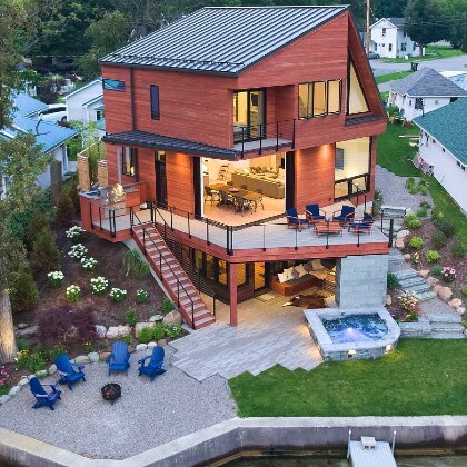 Modern Exterior Cable Railings on deck and stairs of zig zag home