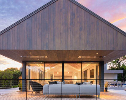 Slim Ithaca Style cable railings on deck of modern home