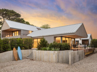 Night time view of modern beach house