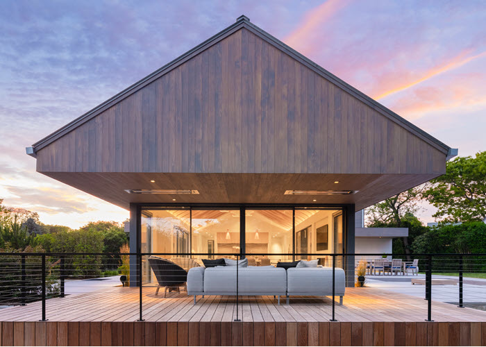 Modern Beach house with powder coated aluminum cable railing system on expansive deck