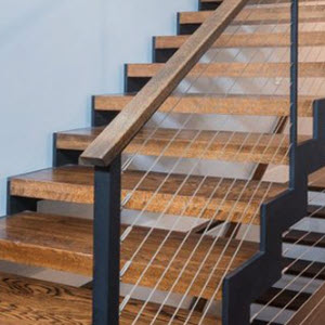 zig zag stair with wood treads and cable railings