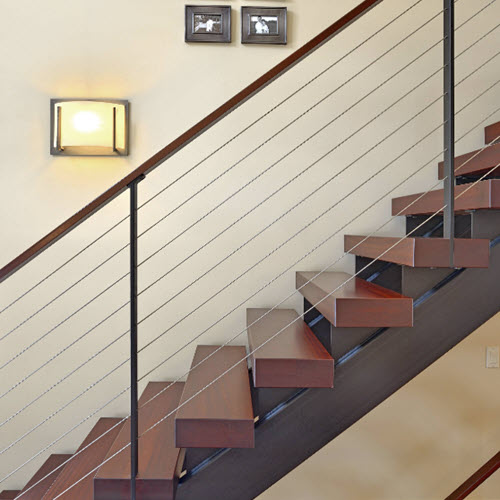 Double metal stringer stair with rectangular tube stringers and wood treads with cable railings.