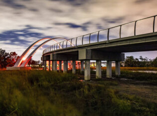 Cable railing system made for commercial bridge with night lighting