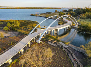 Walkway bridge across Noisette Creek