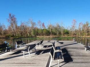 Public dock with cable railing system