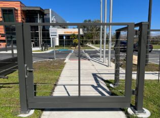 Pedestrian gate with cables