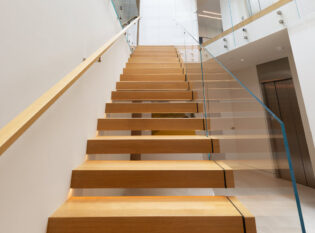 Glass railings on cantilever stairs