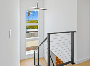 Open staircase with cable railing system.