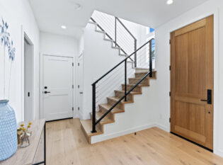 Modern framed cable railings with rustic wood accents