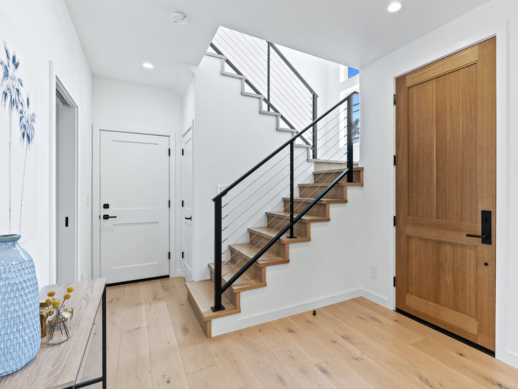 Modern framed cable railings with rustic wood accents