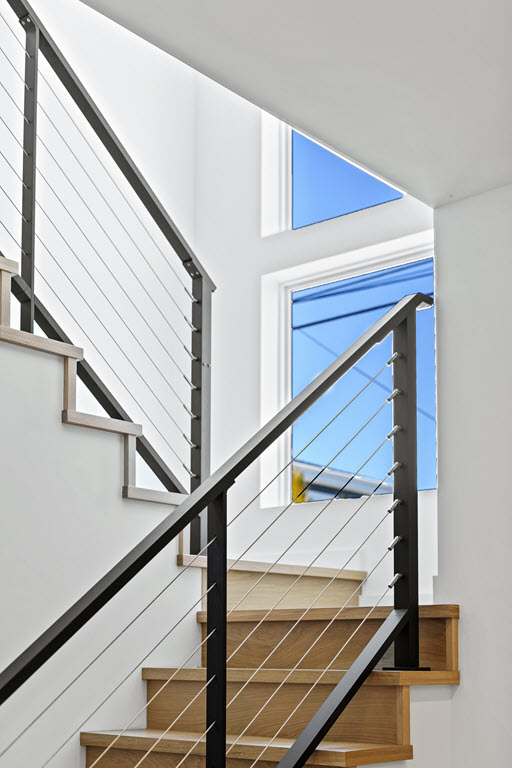 Surface mounted cable railing on stairs