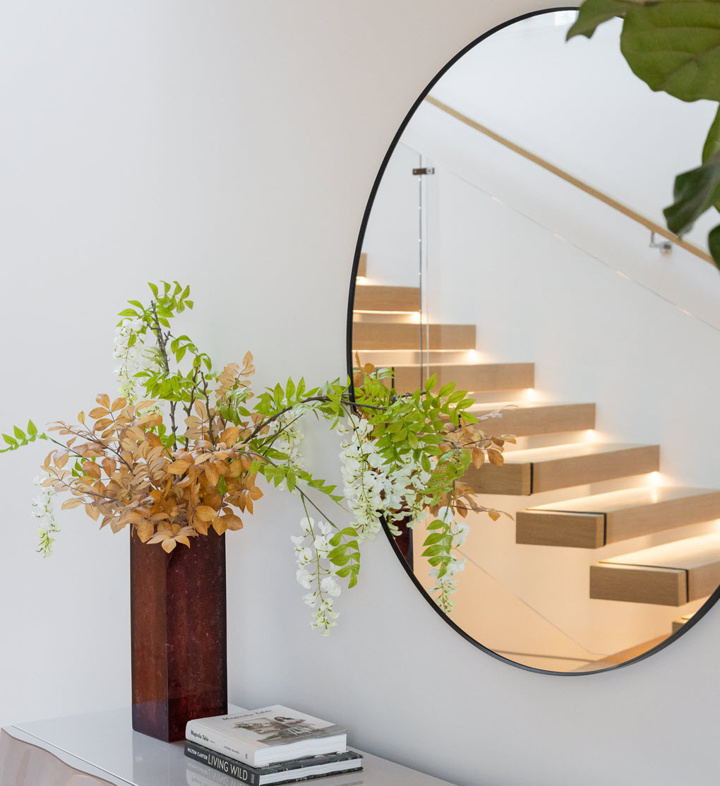 Mirror reflecting cantilever stairs