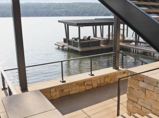 Cable Railings and handrail on stone wall