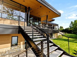 Lime stone treads on Exterior floating stairs