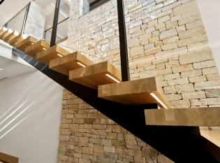 LED lighted treads on a floating staircase
