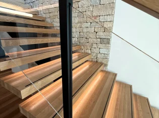 White oak treads with slip resistant strips and LED lighting