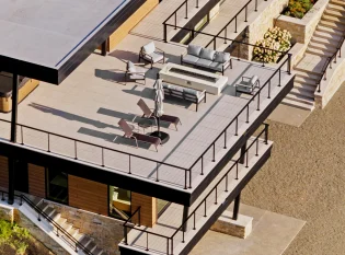 Custom black metal cable railings for decks and stairs