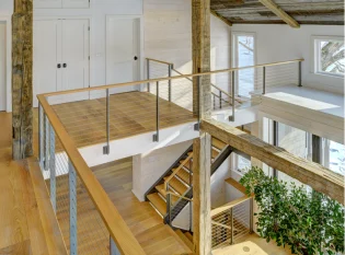 Switchback stairway with steel channel stringers and great room