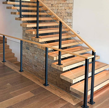 Minimalist glass railing that has the glass recessed into the railing posts. This approach has a clean modern aesthetic.