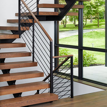modern floating stairs with horizontal spindle railing