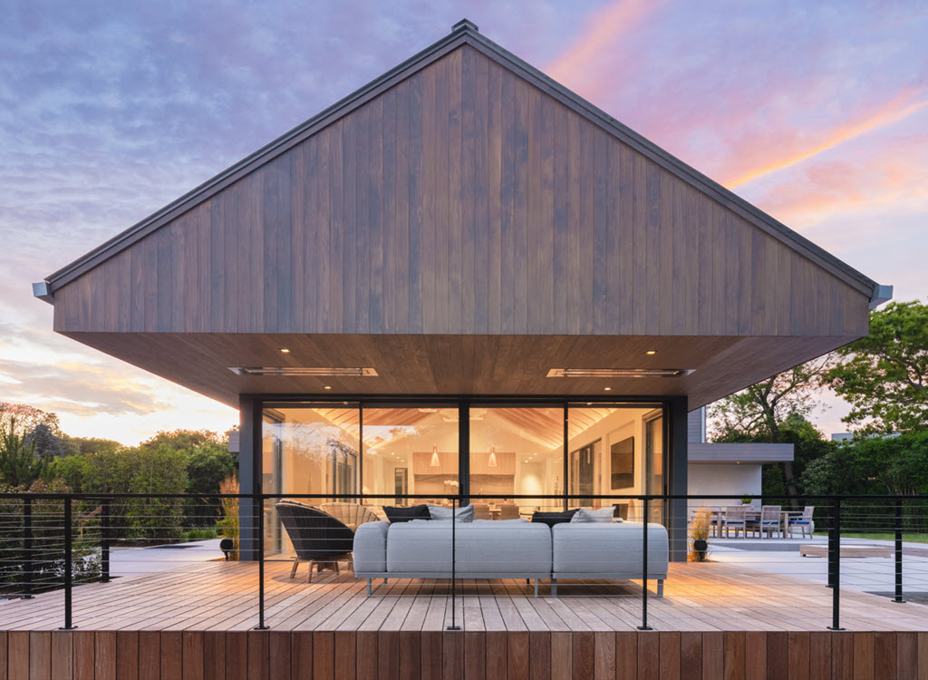 Scandinavian style home with cable railings and plush furniture